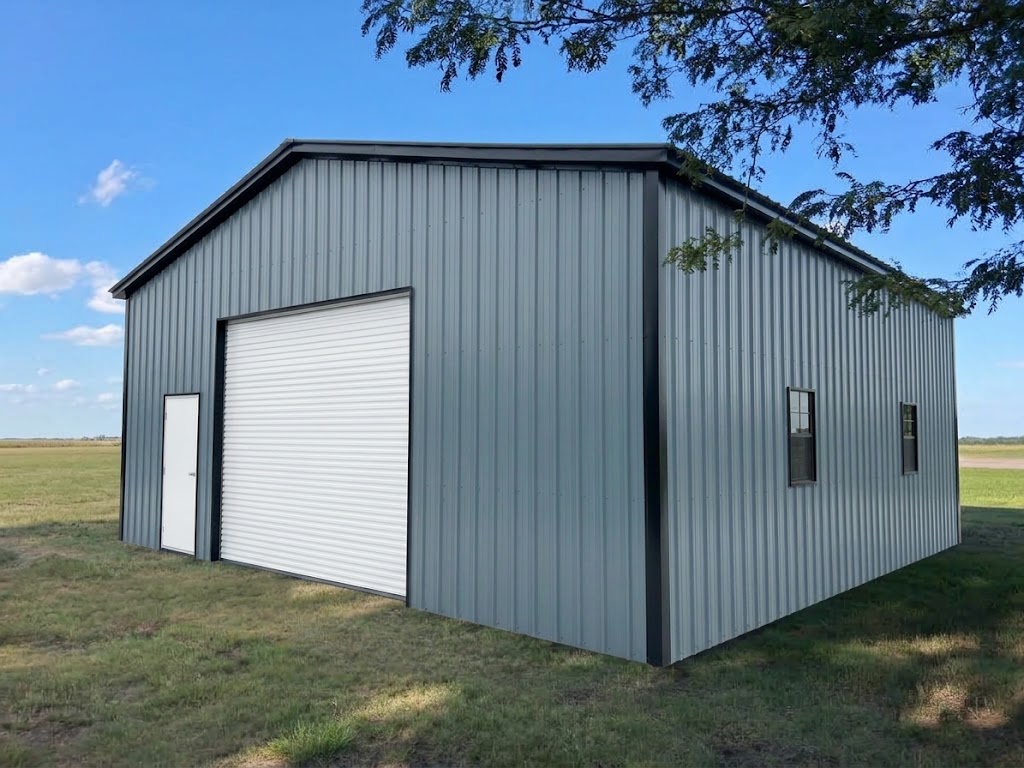 Metal building with roll-up door and windows installed near Liberal, KS