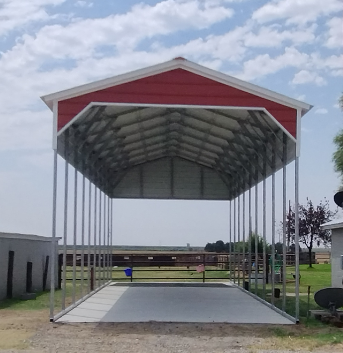 Red and white gable-roof carport with open sides on a concrete pad